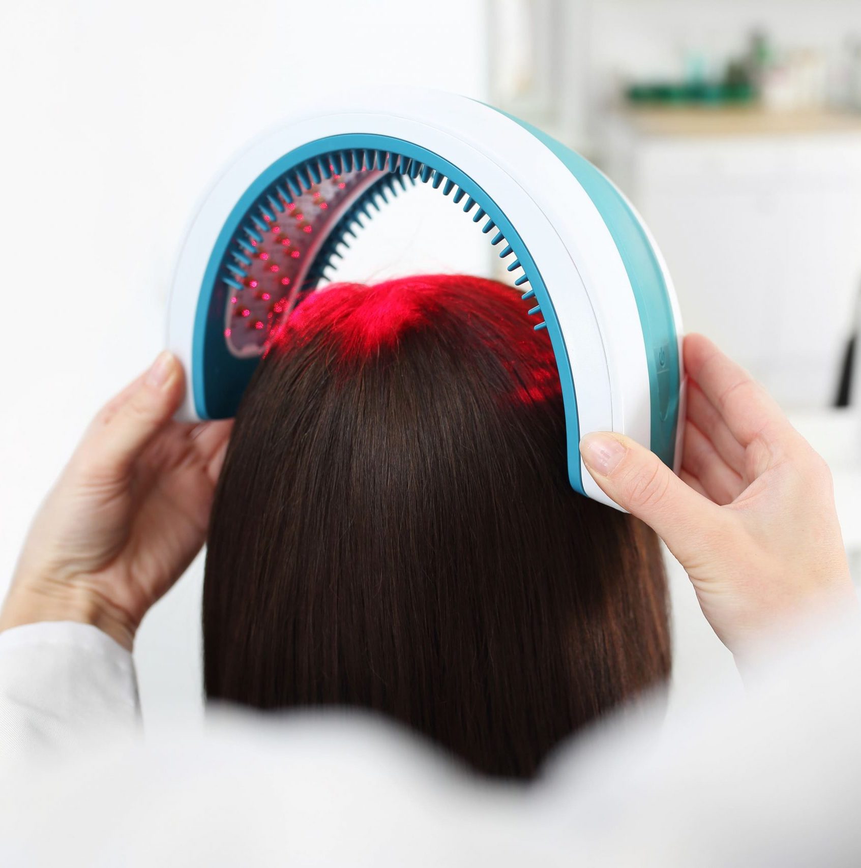 Hair treatment being applied under medical supervision