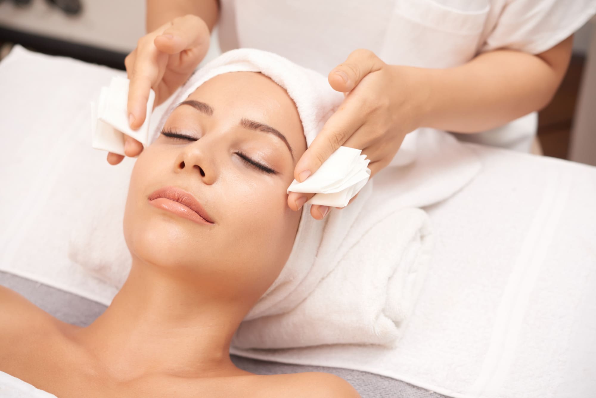 Close-up view of radiofrequency device applied to facial skin