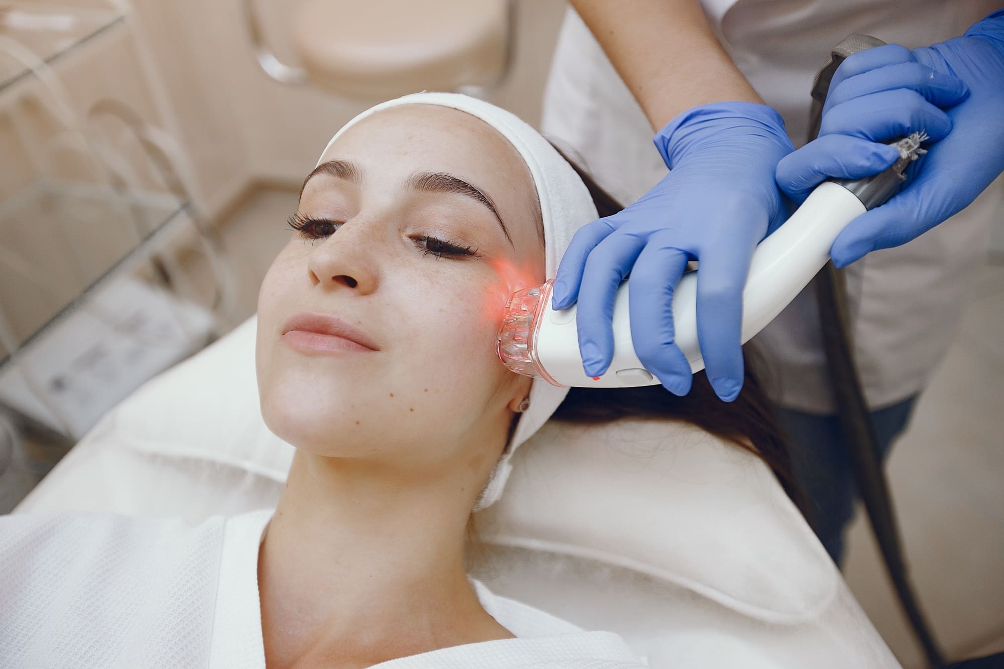 Infrared light-based skin therapy session in progress