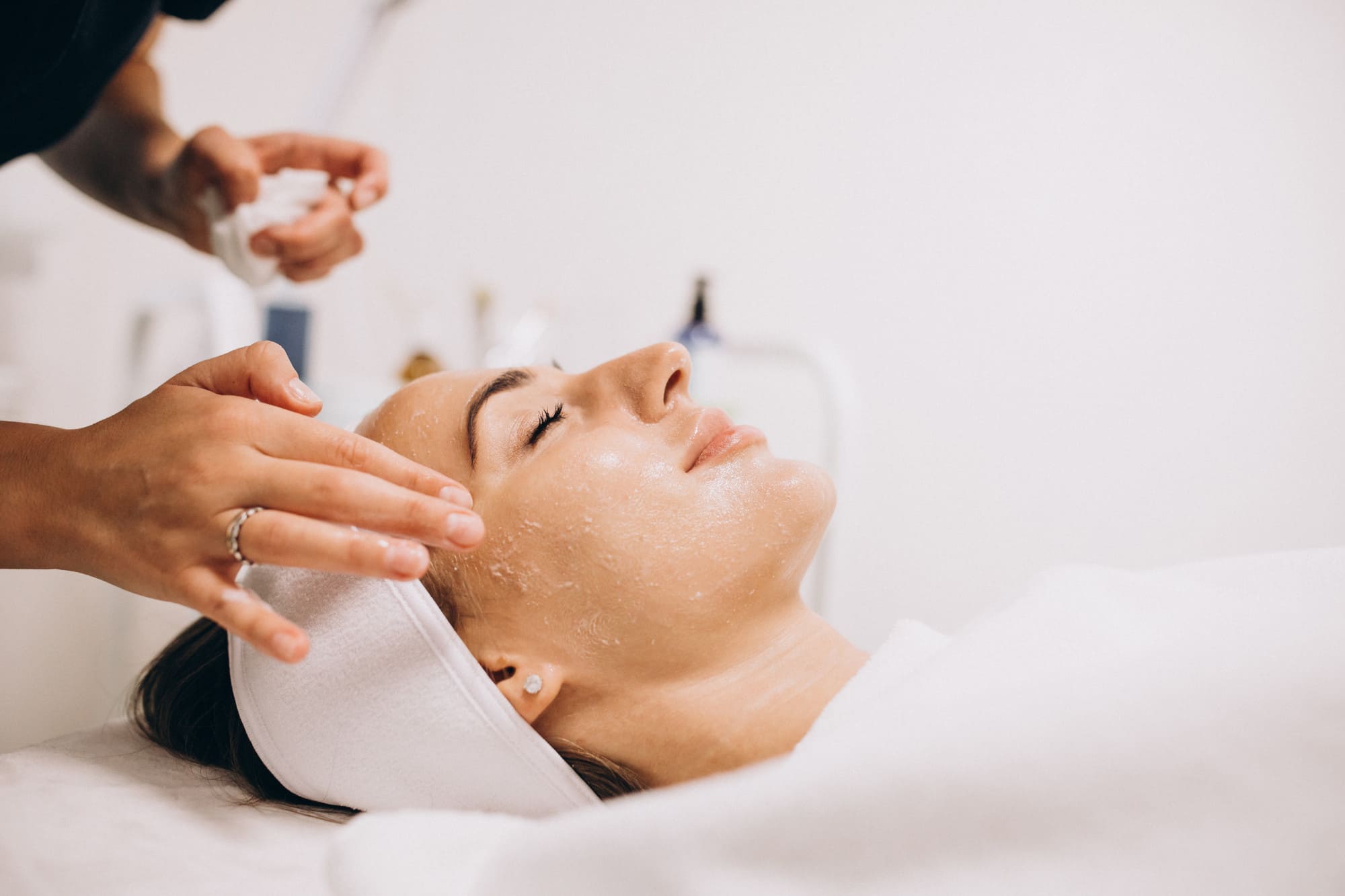 Non-invasive stretch mark skin treatment being performed in clinic