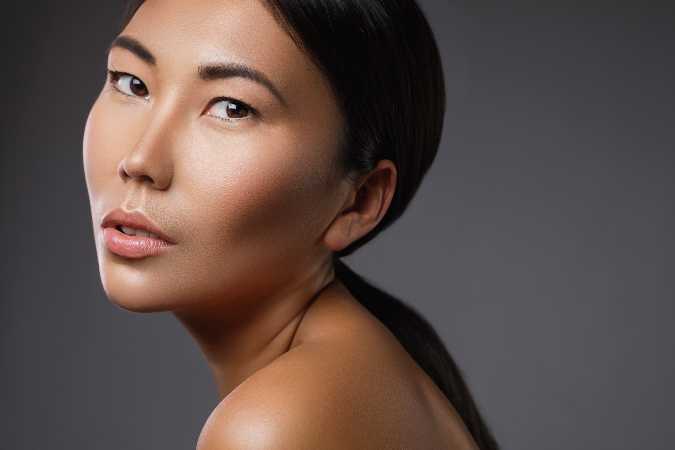 Natural portrait of a young Asian woman with clear skin