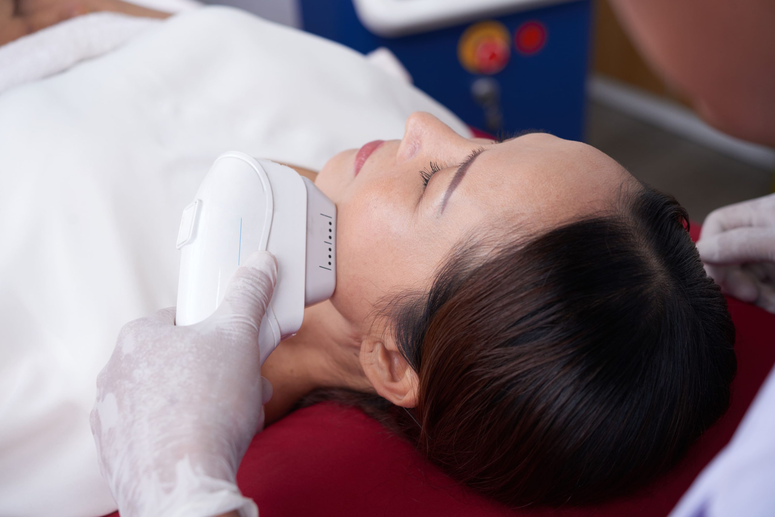 Non-invasive facial skin treatment being performed in a clinical environment